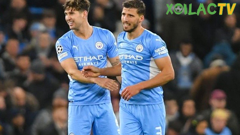 Ruben Dias và John Stones Ruben Dias và John Stones